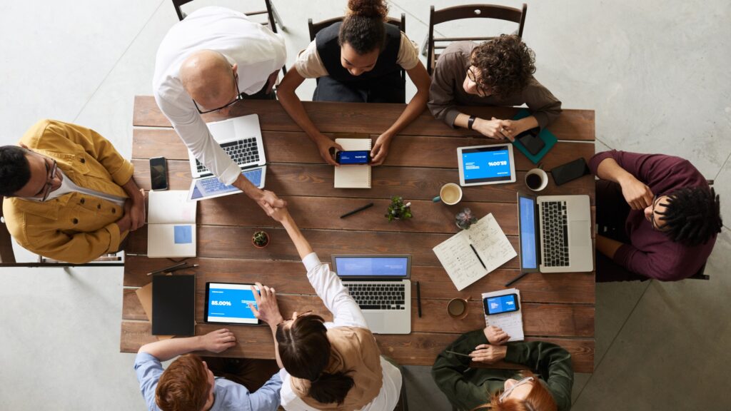 Team collaboration around a conference table.